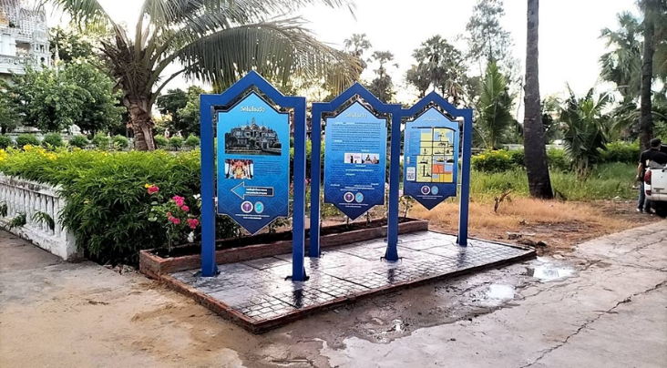 A blue sign on a brick platform

AI-generated content may be incorrect.