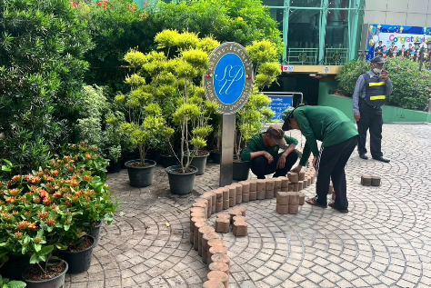 A group of people building a garden

AI-generated content may be incorrect.