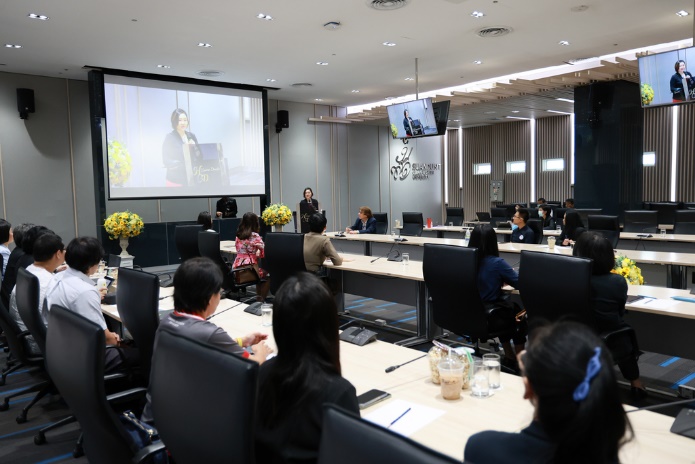 A group of people in a conference room

AI-generated content may be incorrect.