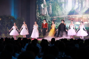 A group of people performing on a stage

AI-generated content may be incorrect.