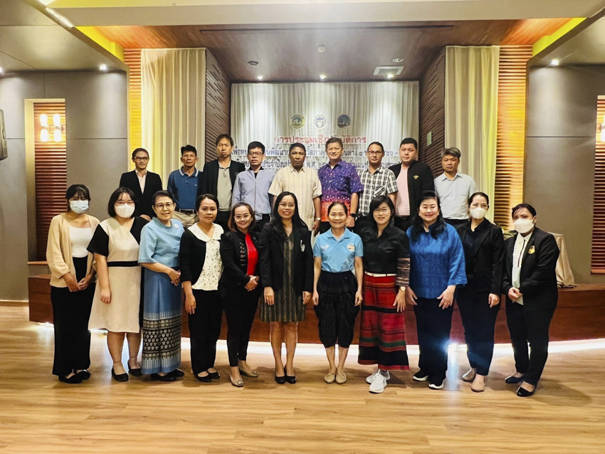 A group of people posing for a photo

Description automatically generated