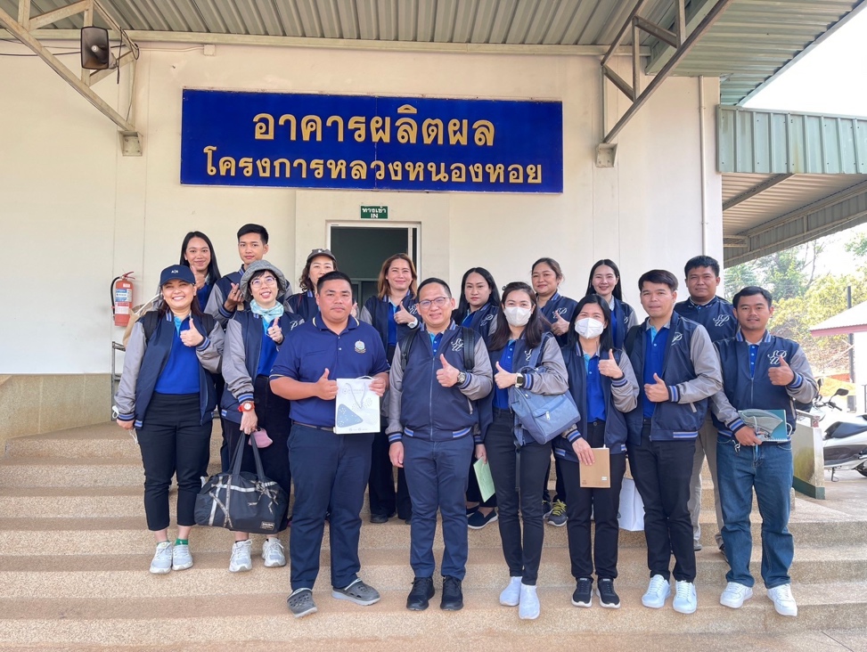 A group of people posing for a photo

Description automatically generated