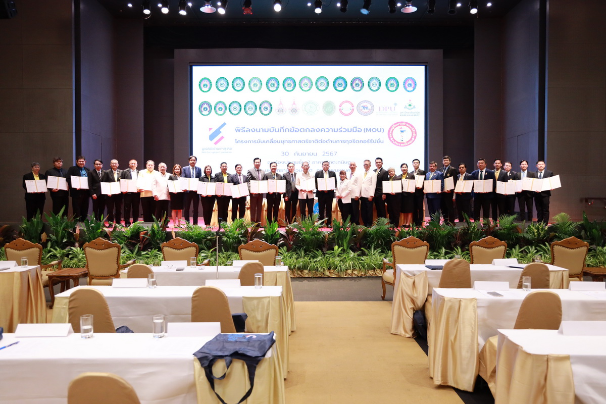 A group of people singing in a room
Description automatically generated