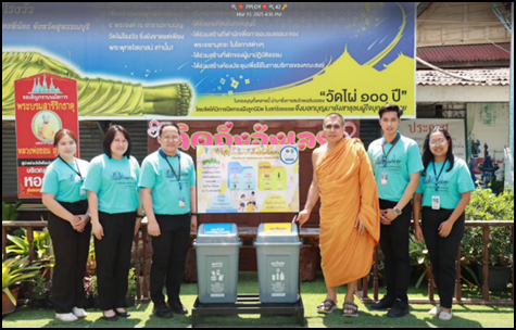 A group of people standing in front of a sign

AI-generated content may be incorrect.