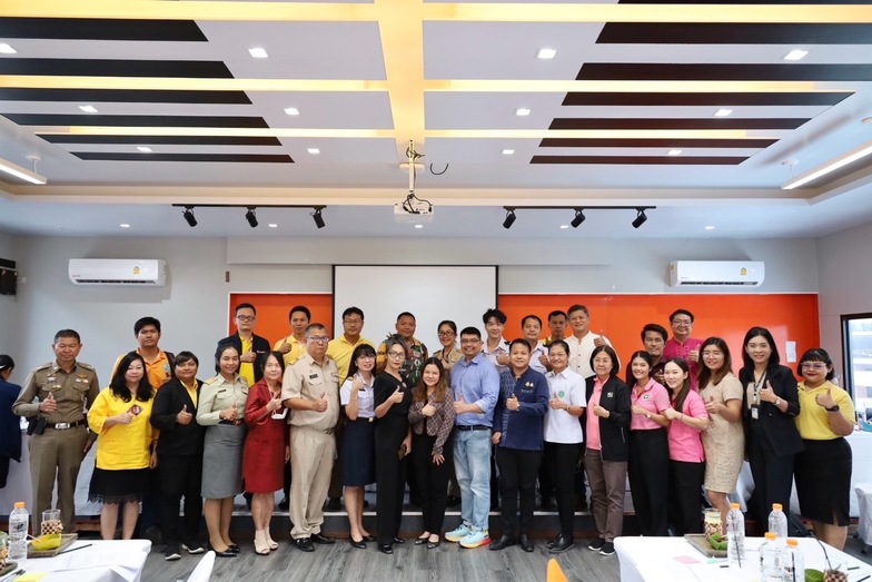 A group of people standing together

Description automatically generated