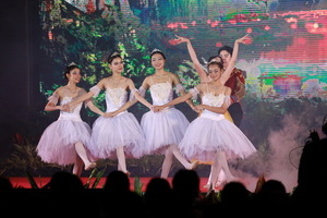 A group of women dancing on a stage

AI-generated content may be incorrect.