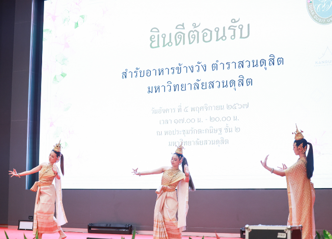 A group of women performing on stage
AI-generated content may be incorrect.