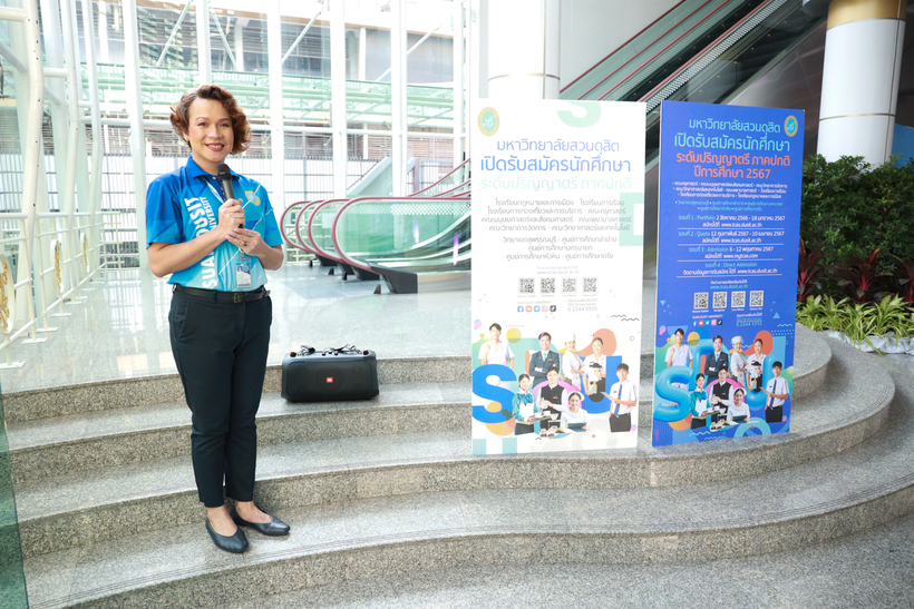 A person standing on steps

Description automatically generated