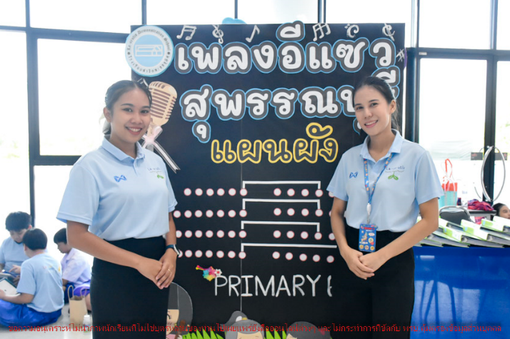 Two women standing in front of a sign
AI-generated content may be incorrect.